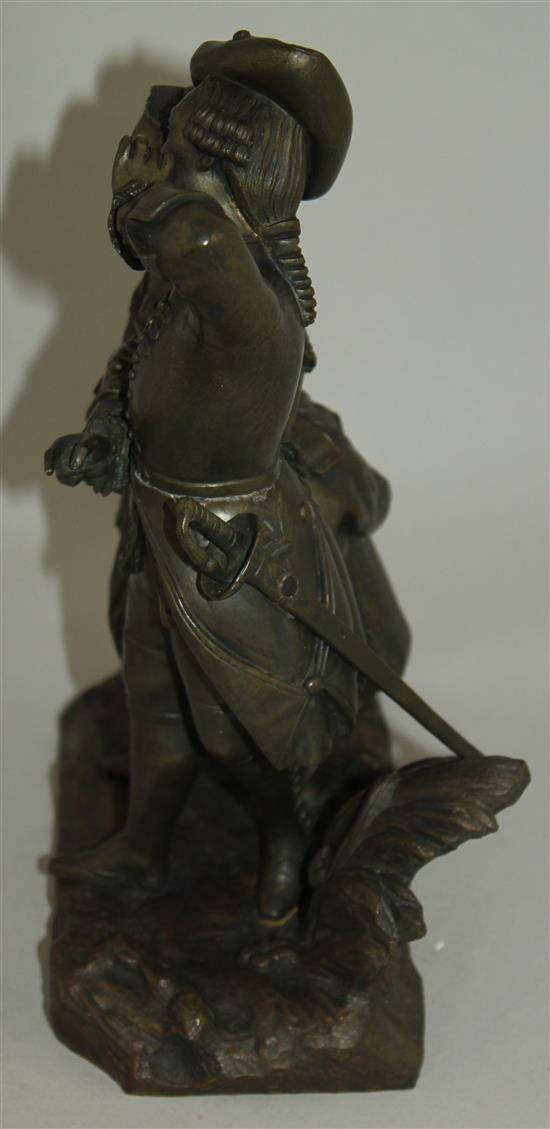 A late 19th century patinated figural bronze modelled as a soldier and his wife, 9.75ins high